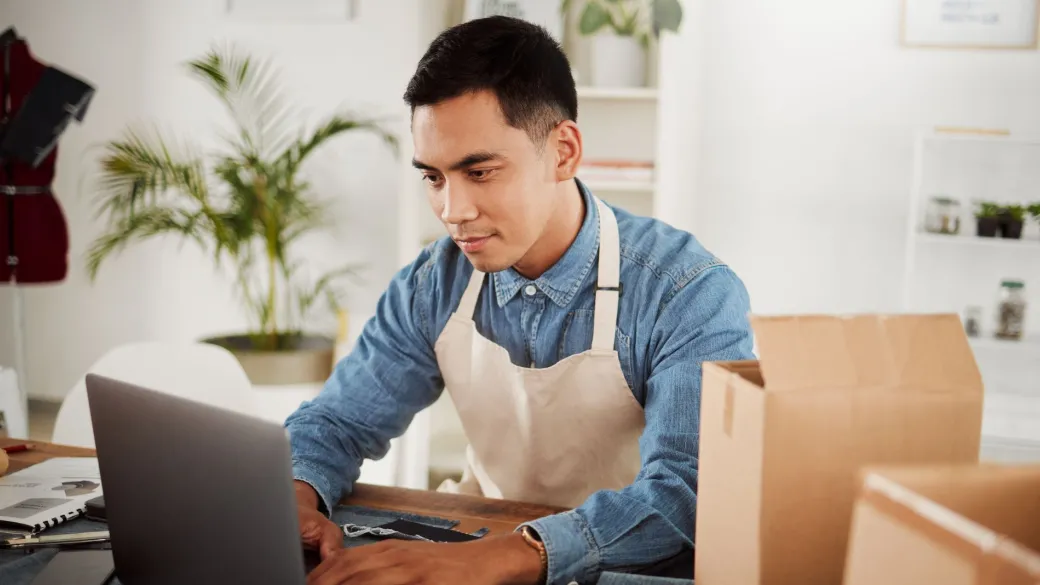 people device management man at laptop