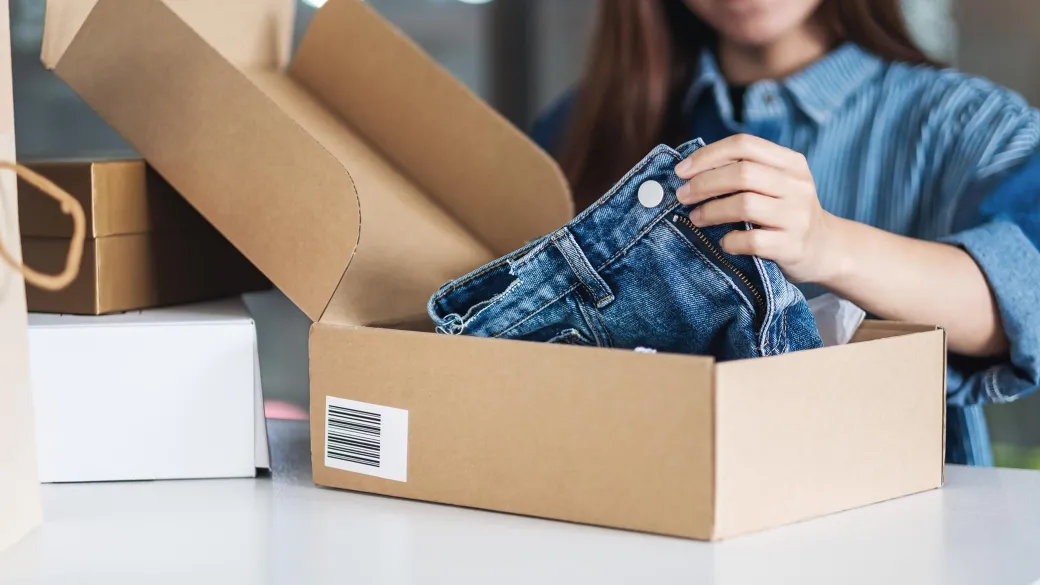 Retail woman opening postal parcel box