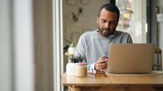 people hosted checkout man at laptop