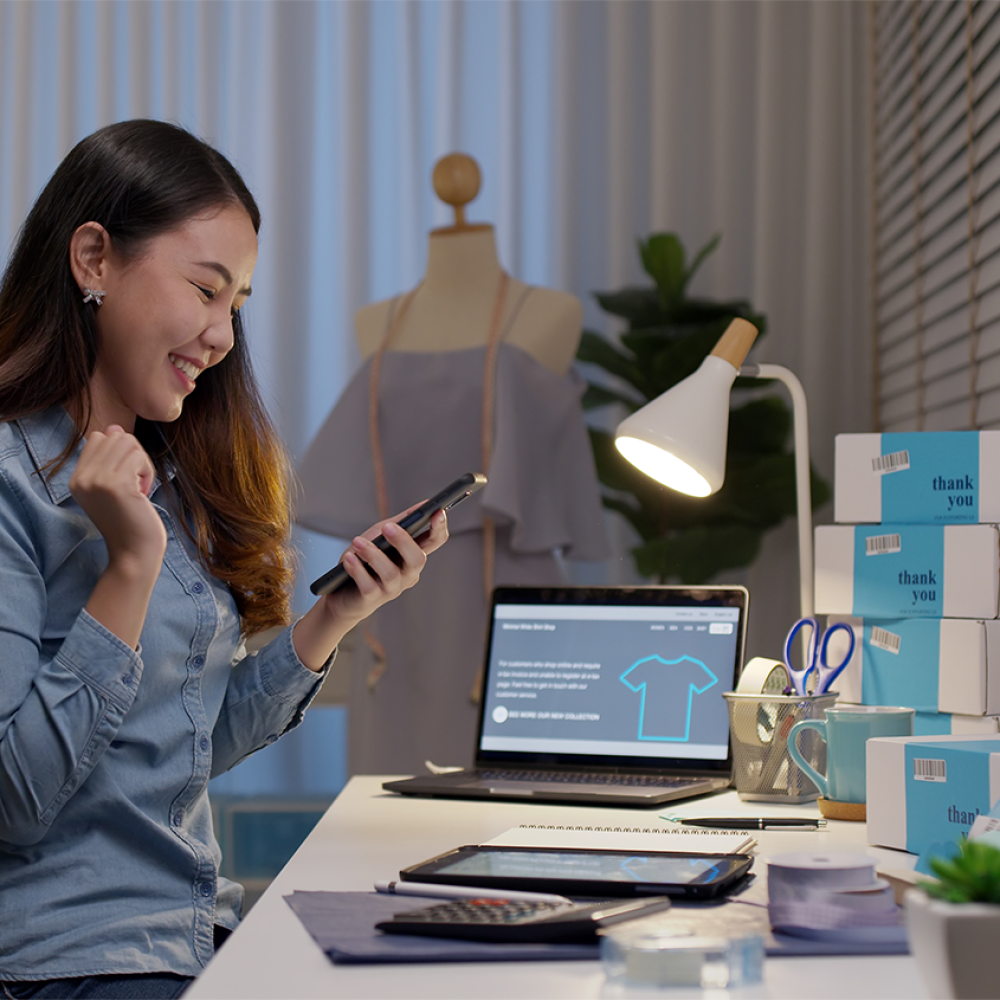 Online merchant happy about receiving sales orders because she enabled buy now, pay later payment acceptance