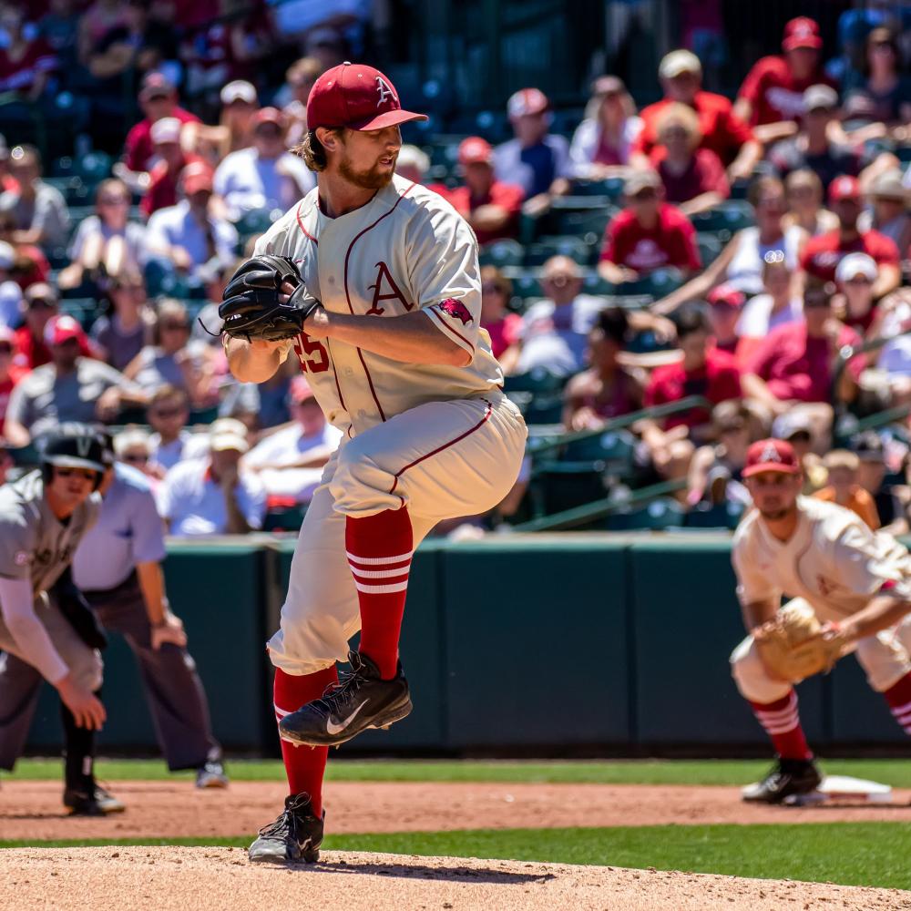 image_baseball pitcher getting ready to throw the ball