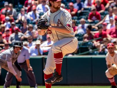 image_baseball pitcher getting ready to throw the ball